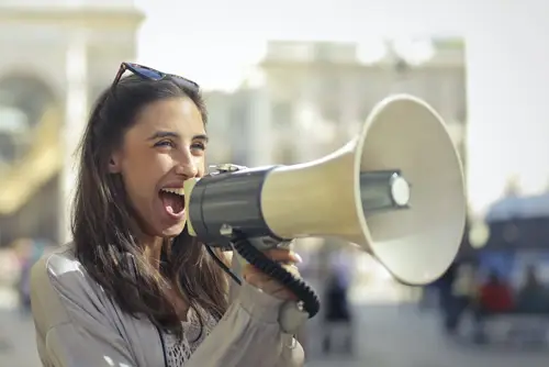 Woman holding a megaphone